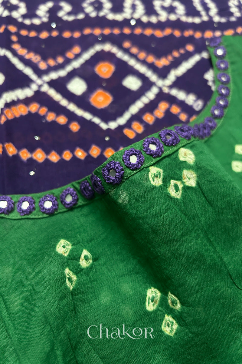 Mirror work neckline detail on mulmul cotton bandhani kaftan in green and purple, handcrafted in Kutch.
