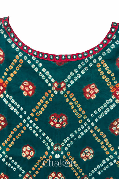 Kutch Bandhani pattern with mirror neckline detail on handcrafted cotton mulmul kaftan dress.
