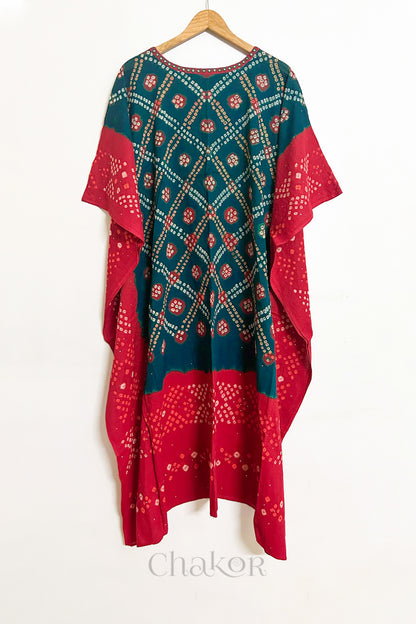 Handcrafted Kutch bandhani women's kaftan hanging full length in mulmul cotton with mirror work, loose fit for summer.
