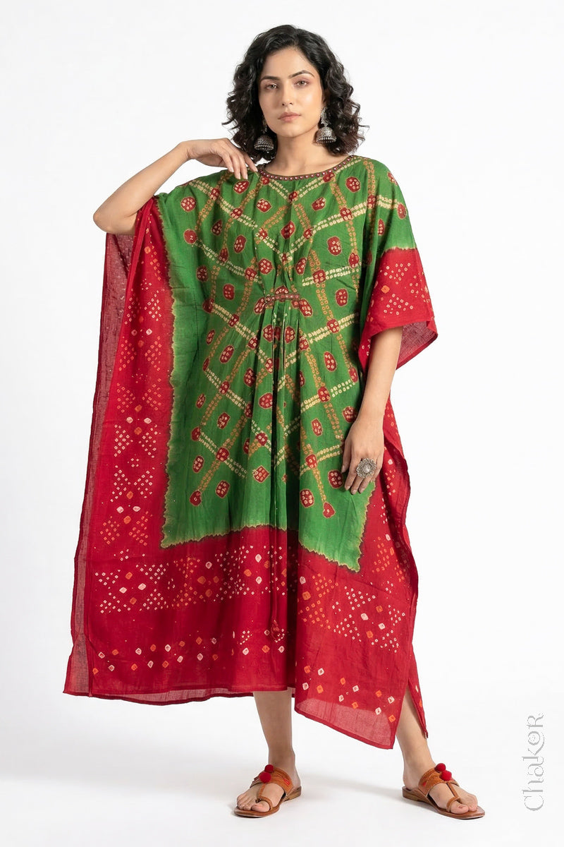 Handcrafted Kutch bandhani kaftan dress in breathable mulmul cotton with mirror & mukaish work.