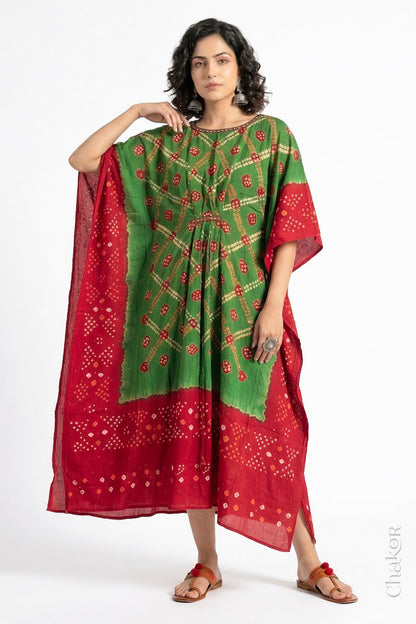 Handcrafted Kutch bandhani kaftan dress in breathable mulmul cotton with mirror & mukaish work.