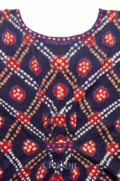 Kutch Bandhani pattern with mirror neckline detail on handcrafted cotton mulmul kaftan dress.
