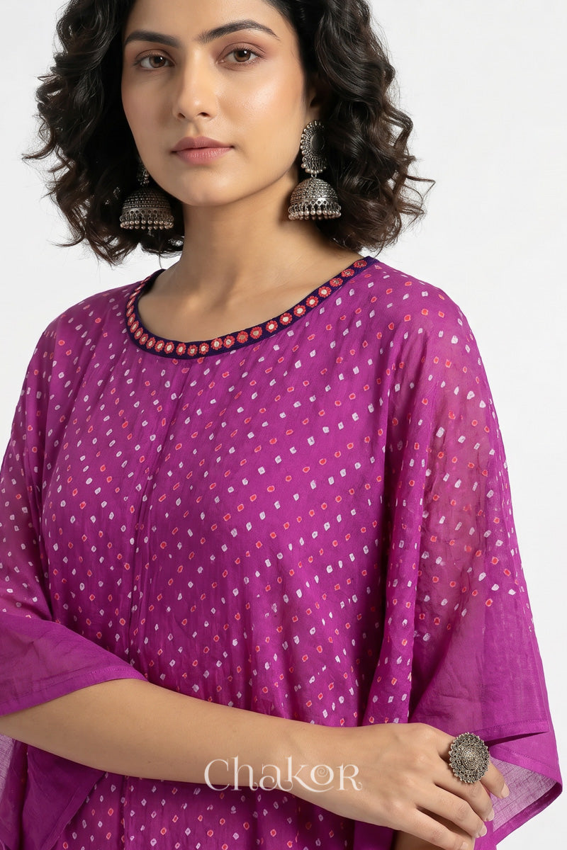 Bandhani kaftan neckline with mirror work detail in magenta mulmul cotton for summer.
