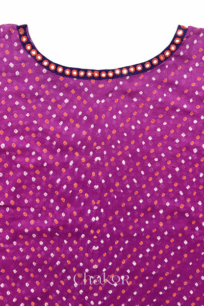 Kutch Bandhani pattern with mirror neckline detail on handcrafted cotton mulmul kaftan dress.
