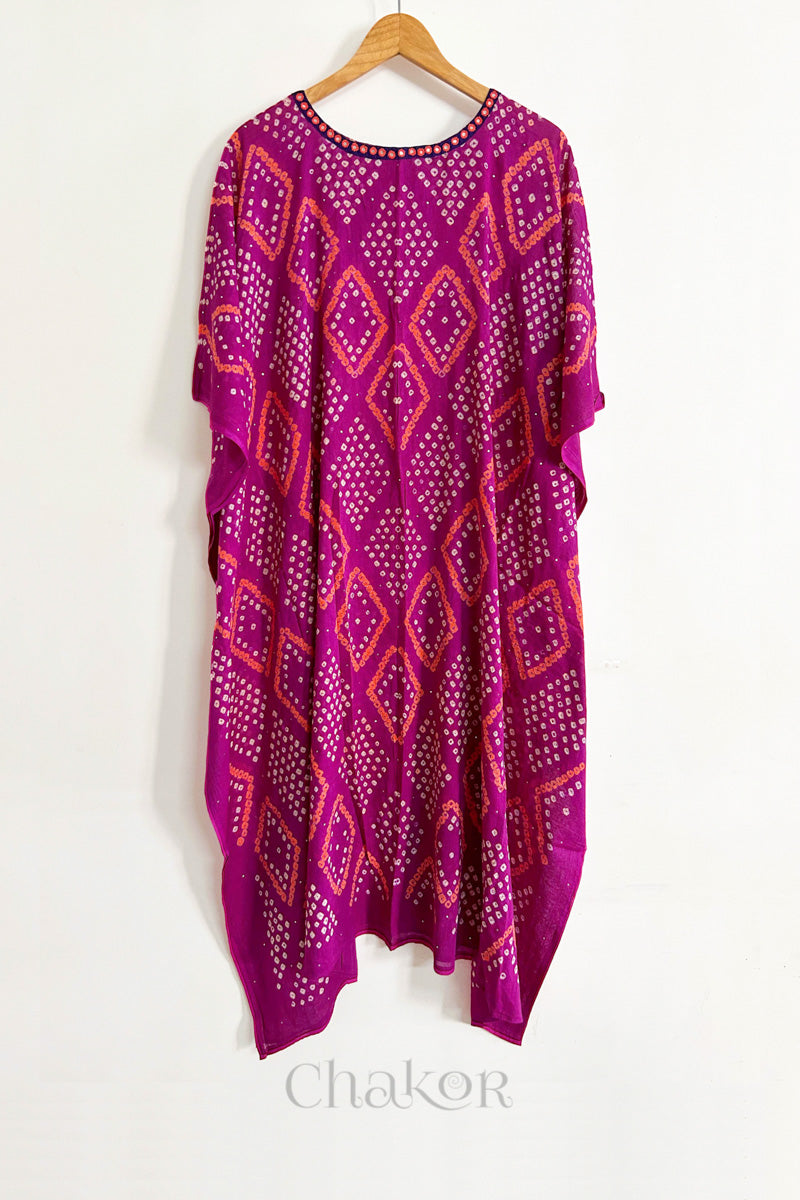 Handcrafted Kutch bandhani women's kaftan hanging full length in mulmul cotton with mirror work, loose fit for summer.
