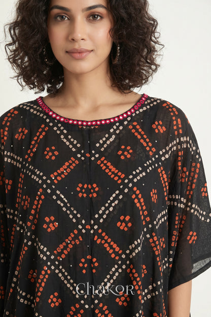 Bandhani kaftan neckline with mirror work detail in black mulmul cotton for summer.
