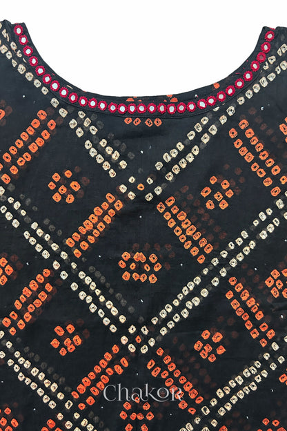 Kutch Bandhani pattern with mirror neckline detail on handcrafted cotton mulmul kaftan dress.
