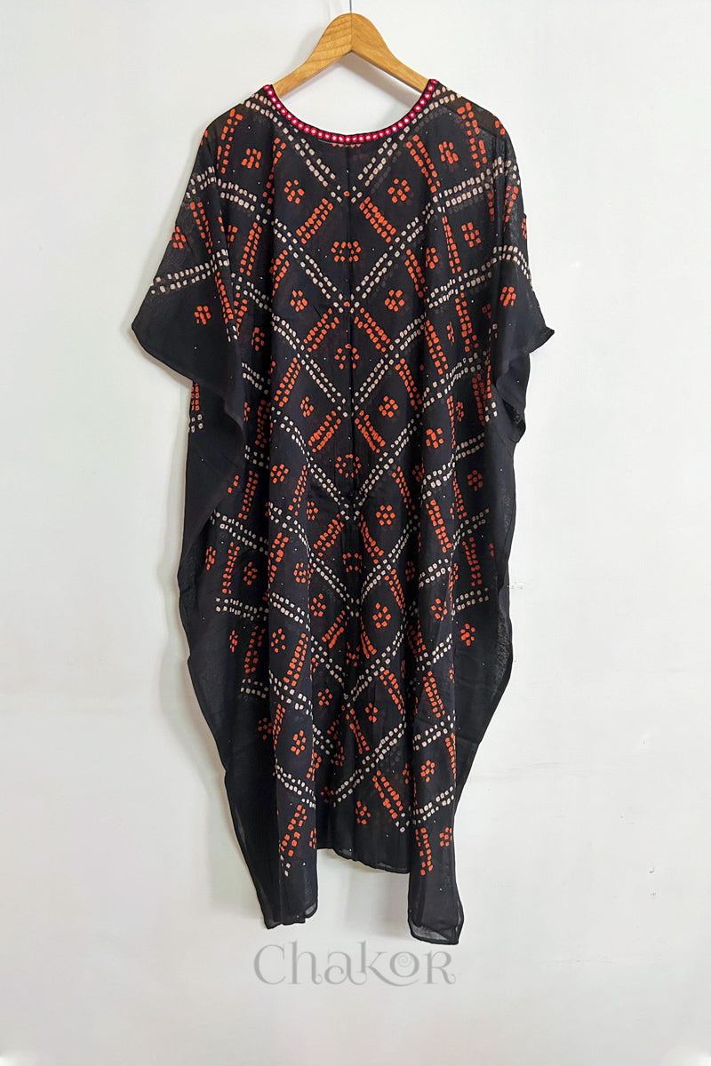 Handcrafted Kutch bandhani women's kaftan hanging full length in mulmul cotton with mirror work, loose fit for summer.
