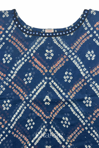 Kutch Bandhani pattern with mirror neckline detail on handcrafted cotton mulmul kaftan dress.
