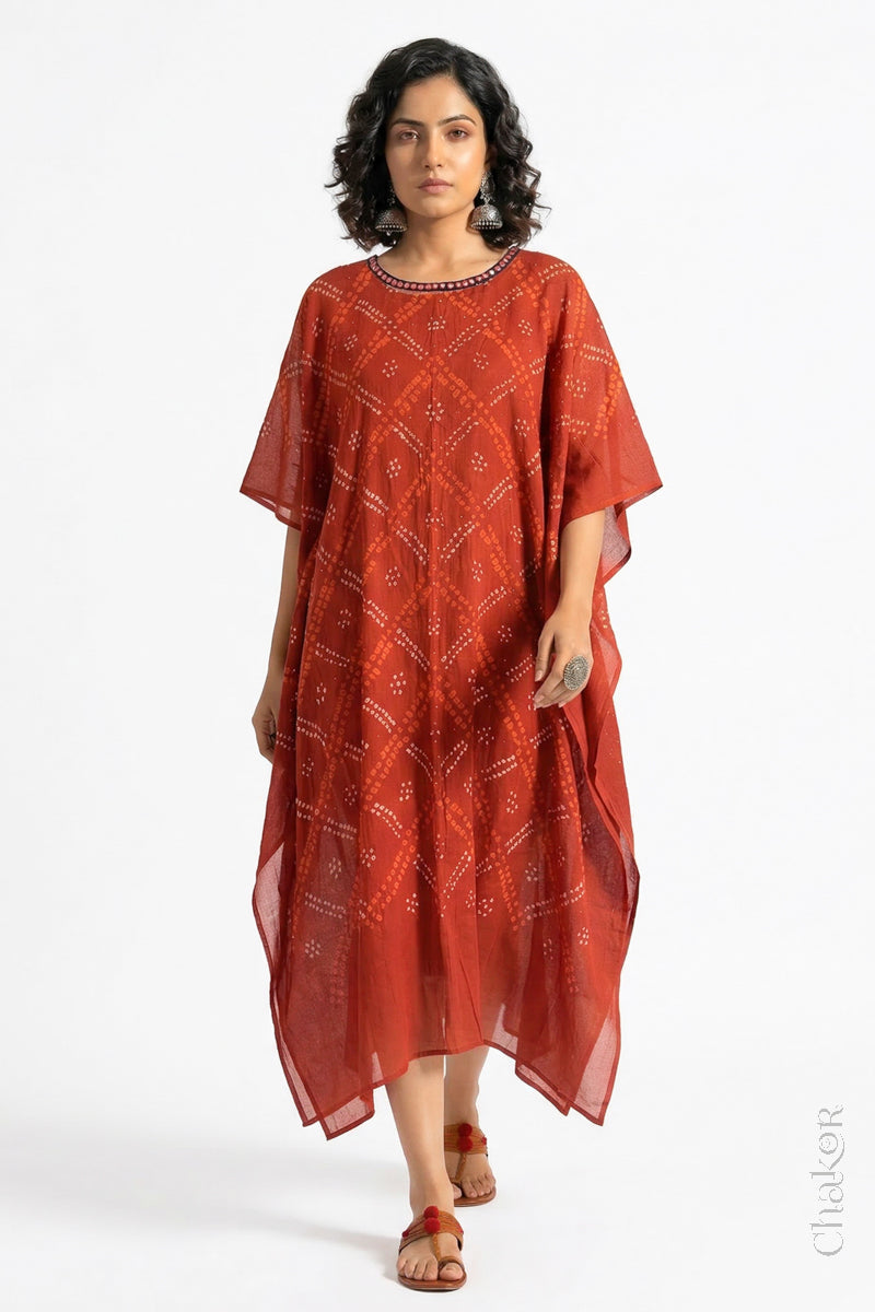 Mulmul cotton bandhani kaftan dress for women with mirror work in rusty orange, relaxed fit for summer.

