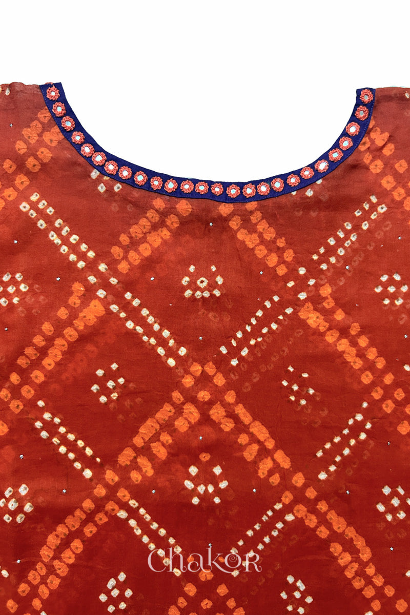 Kutch Bandhani pattern with mirror neckline detail on handcrafted cotton mulmul kaftan dress.
