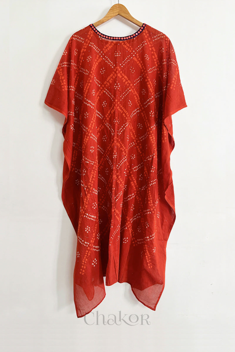 Handcrafted Kutch bandhani women's kaftan hanging full length in mulmul cotton with mirror work, loose fit for summer.
