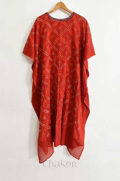 Handcrafted Kutch bandhani women's kaftan hanging full length in mulmul cotton with mirror work, loose fit for summer.

