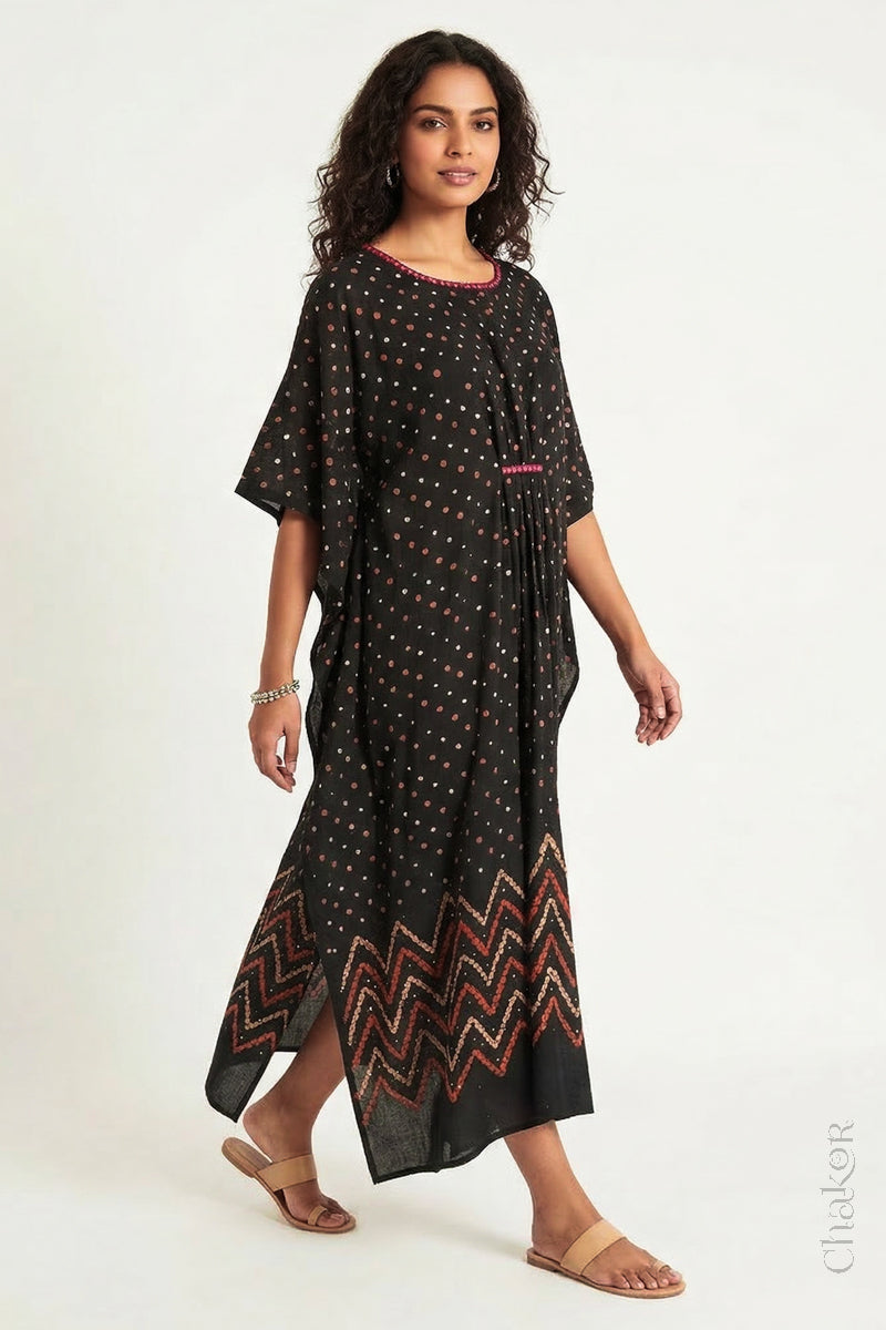 Mulmul cotton bandhani kaftan dress for women with mirror work in black, relaxed fit for summer.
