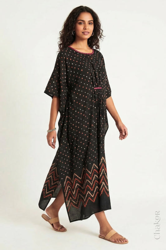 Mulmul cotton bandhani kaftan dress for women with mirror work in black, relaxed fit for summer.
