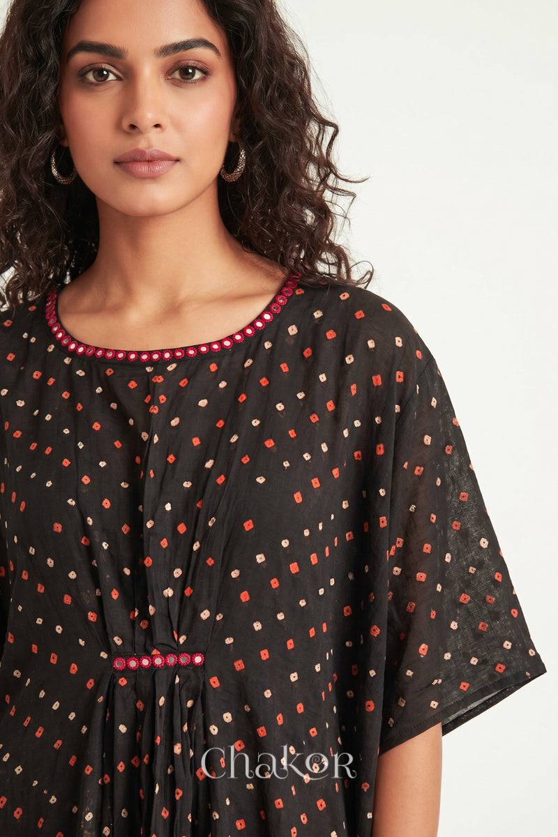 Bandhani kaftan neckline with mirror work detail in black mulmul cotton for summer.
