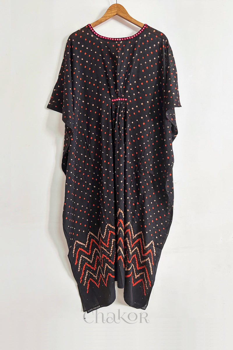Handcrafted Kutch bandhani women's kaftan hanging full length in mulmul cotton with mirror work, loose fit for summer.
