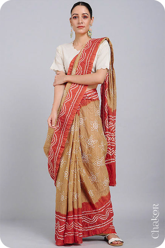 Handcrafted Beige Rust Bandhani Mul Cotton Saree by Chakor.