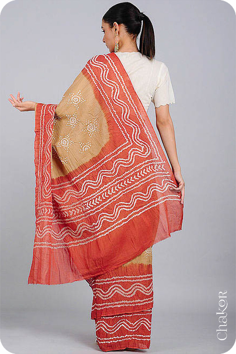 Handcrafted Beige Rust Bandhani Mul Cotton Saree by Chakor.