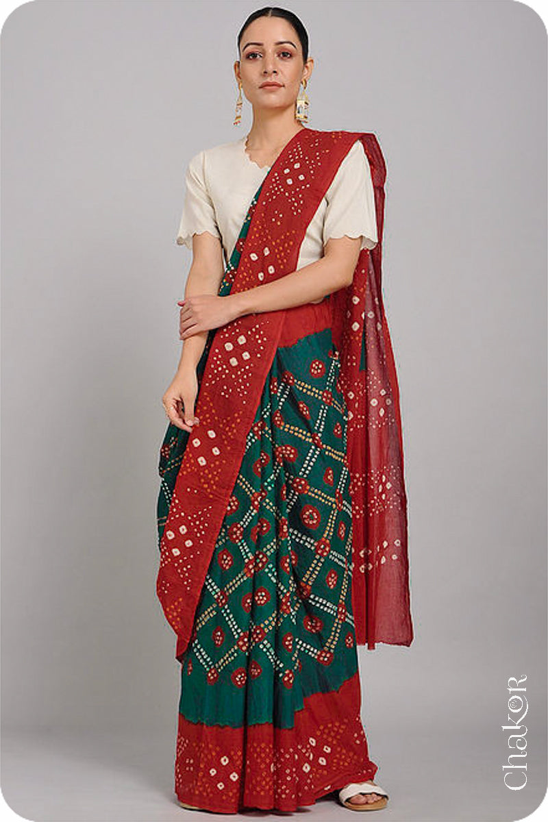 Traditional Green Red Bandhani Mul Cotton Saree by Chakor.Traditional Green Red Bandhani Mul Cotton Saree by Chakor.