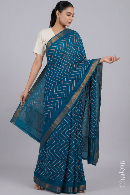 Woman wearing Indigo Blue Bandhani Mangalagiri Handloom Cotton Saree, with handcrafted rai bandhej patterns using traditional tie-dye techniques.