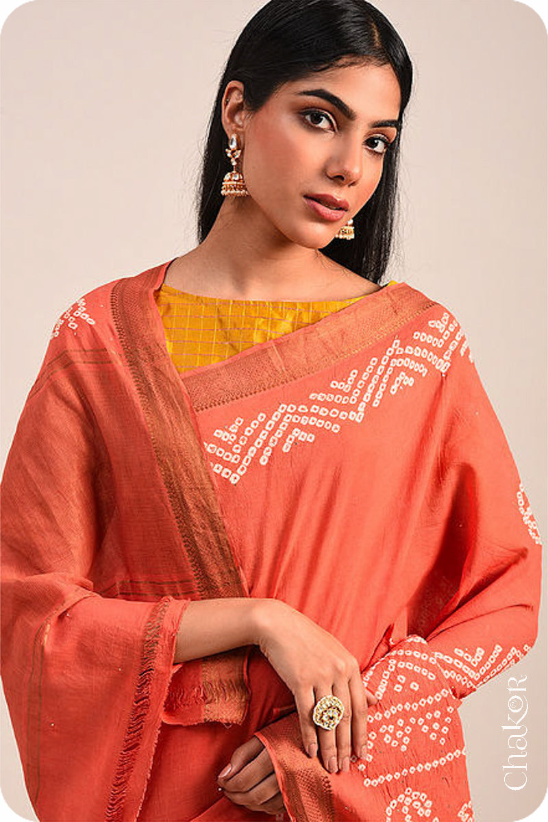 Peach Traditional Bandhani Mangalgiri Cotton Saree with zari border and pallu by Chakor.