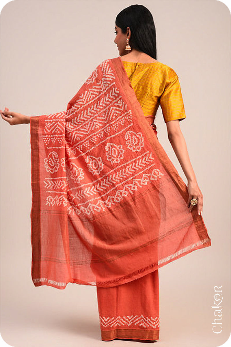 Peach Traditional Bandhani Mangalgiri Cotton Saree with zari border and pallu by Chakor.