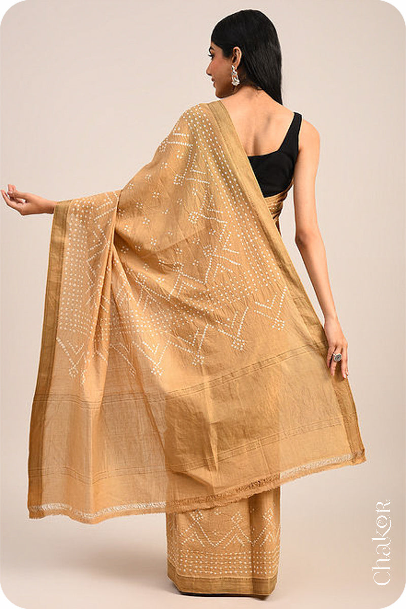 Beige Bandhani Mangalgiri Cotton Saree with zari border and pallu by Chakor.