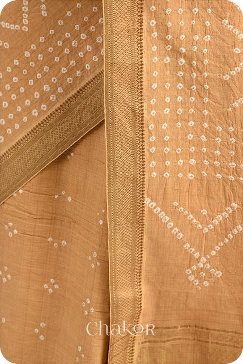 Beige Bandhani Mangalgiri Cotton Saree with zari border and pallu by Chakor.