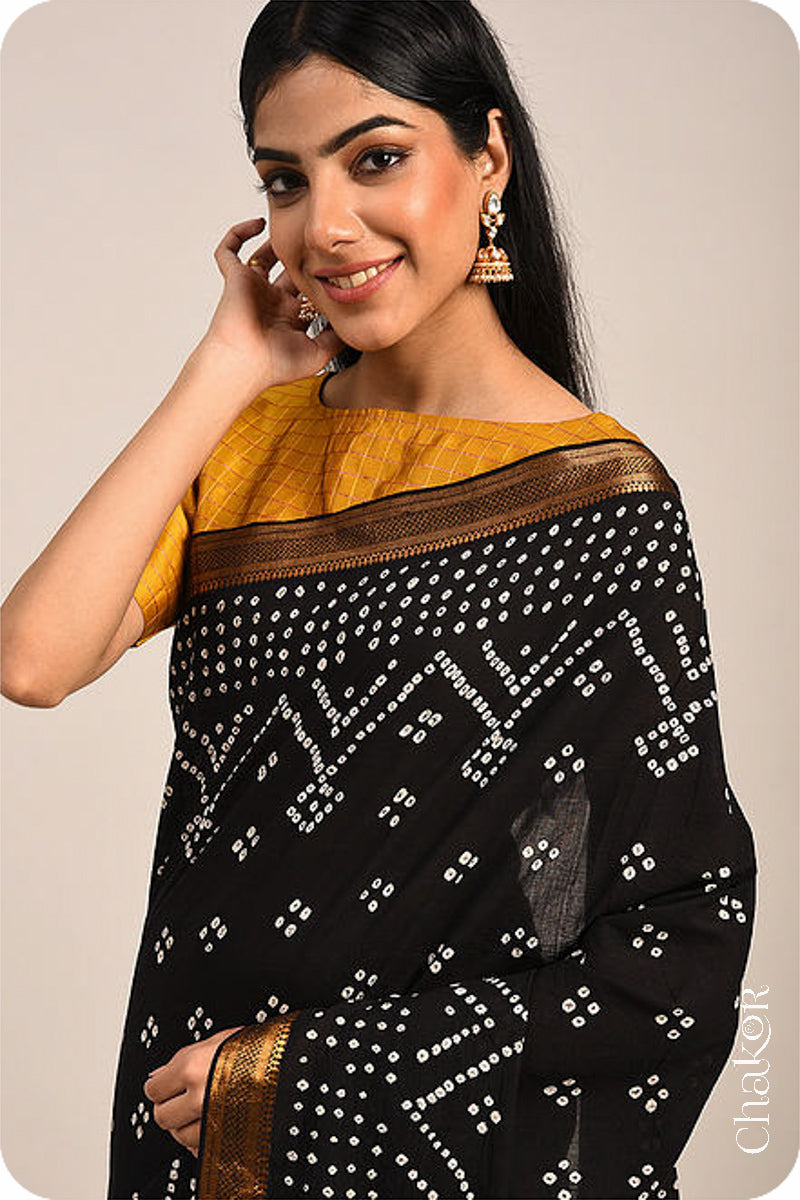 Black Traditional Bandhani Mangalgiri Cotton Saree with zari border and pallu by Chakor.