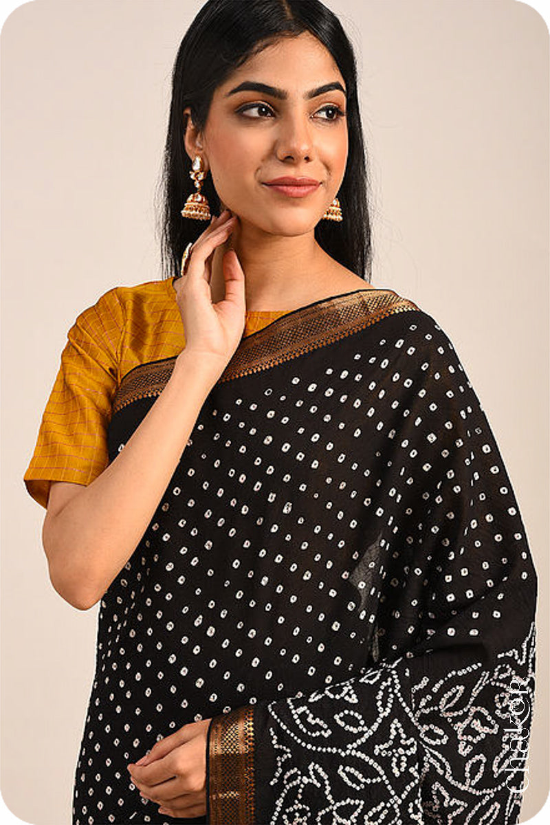 Black Traditional Bandhani Mangalgiri Cotton Saree with zari border and pallu by Chakor.