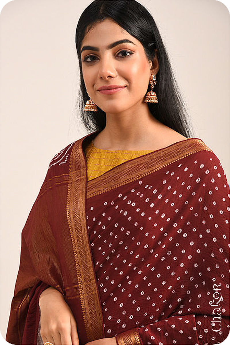 Maroon Traditional Bandhani Mangalgiri Cotton Saree with zari border and pallu by Chakor.