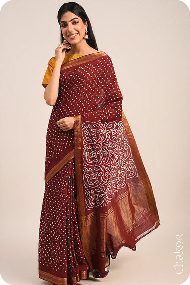 Maroon Traditional Bandhani Mangalgiri Cotton Saree with zari border and pallu by Chakor.