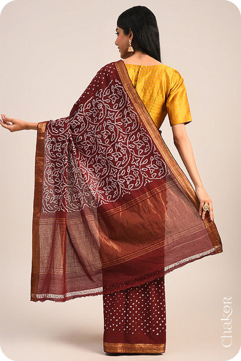 Maroon Traditional Bandhani Mangalgiri Cotton Saree with zari border and pallu by Chakor.