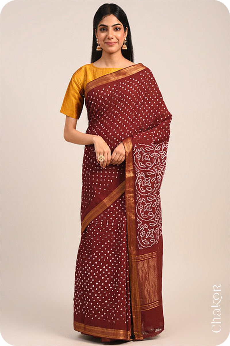 Maroon Traditional Bandhani Mangalgiri Cotton Saree with zari border and pallu by Chakor.