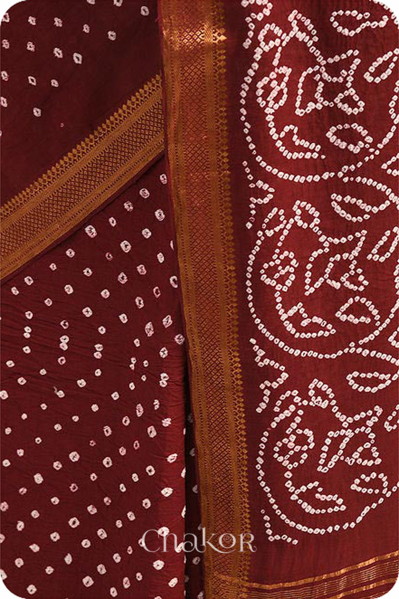 Maroon Traditional Bandhani Mangalgiri Cotton Saree with zari border and pallu by Chakor.