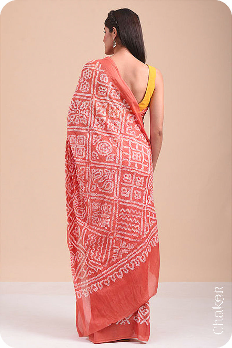 Traditional Peach Bandhani Mul Cotton Saree by Chakor.Traditional Peach Bandhani Mul Cotton Saree by Chakor.