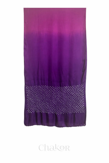Full view of bandhani stole featuring ombre dyeing in magenta & purple and lustrous texture of modal fabric with 'Chakor' branding.
