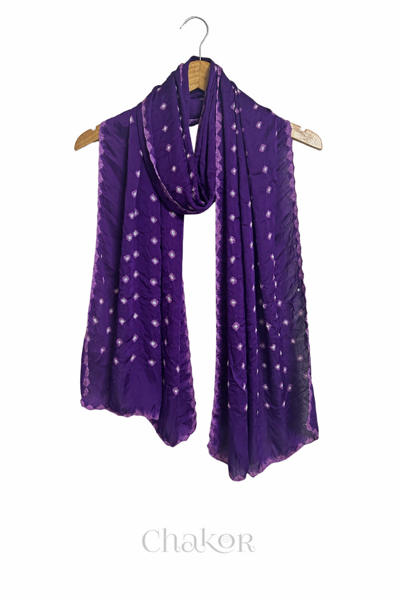 purple Bandhani modal stole displayed on wooden hanger showing full length, drape and tie-dye layout.
