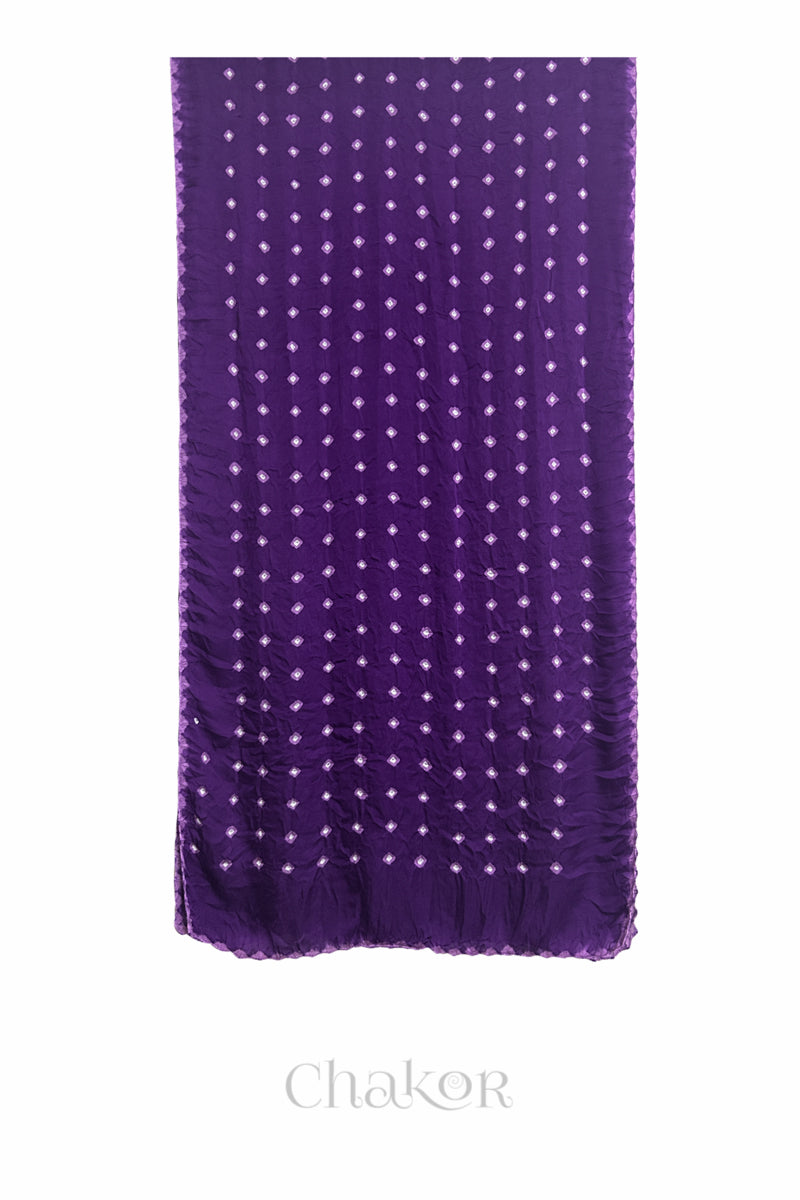 Flat view of purple Bandhani modal stole showing evenly spaced tie-dye pattern.
