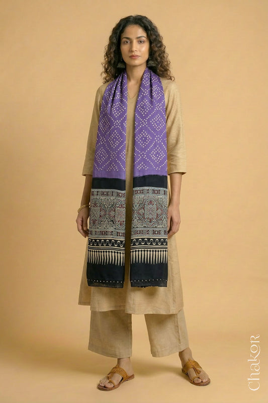 Handcrafted Bandhani Ajrakh modal stole draped on model with Mauve Bandhani body and black Ajrakh pallu.
