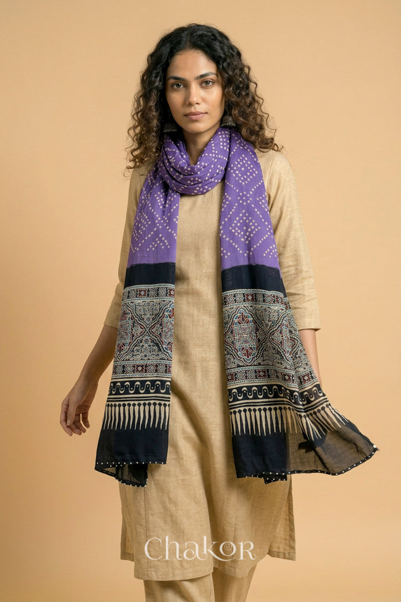 Flowing Mauve modal Bandhani stole with iron  black  Ajrakh pallu showing movement and lightweight drape.
