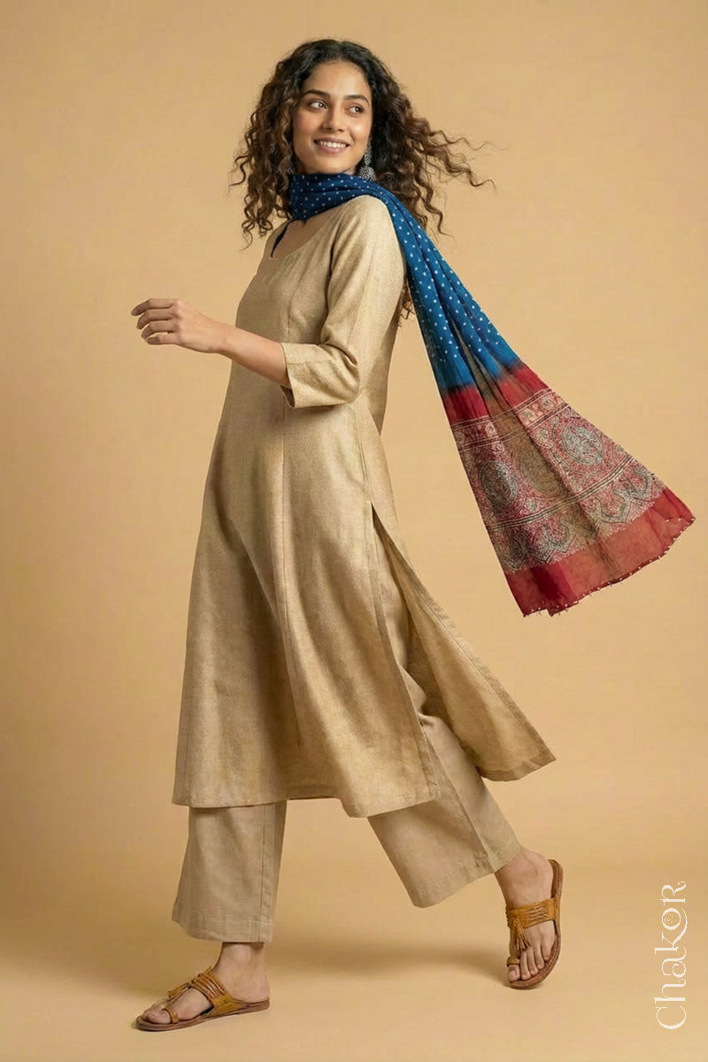 Flowing Blue modal Bandhani stole with Madder Red  Ajrakh pallu showing movement and lightweight drape.
