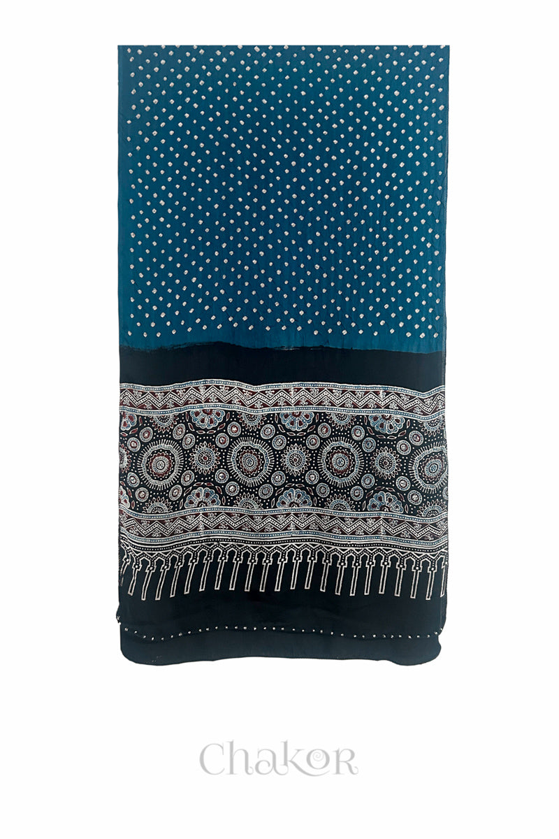 indigo blue Bandhani modal stole with black Ajrakh pallu and traditional block print layout and glass bead edging.
