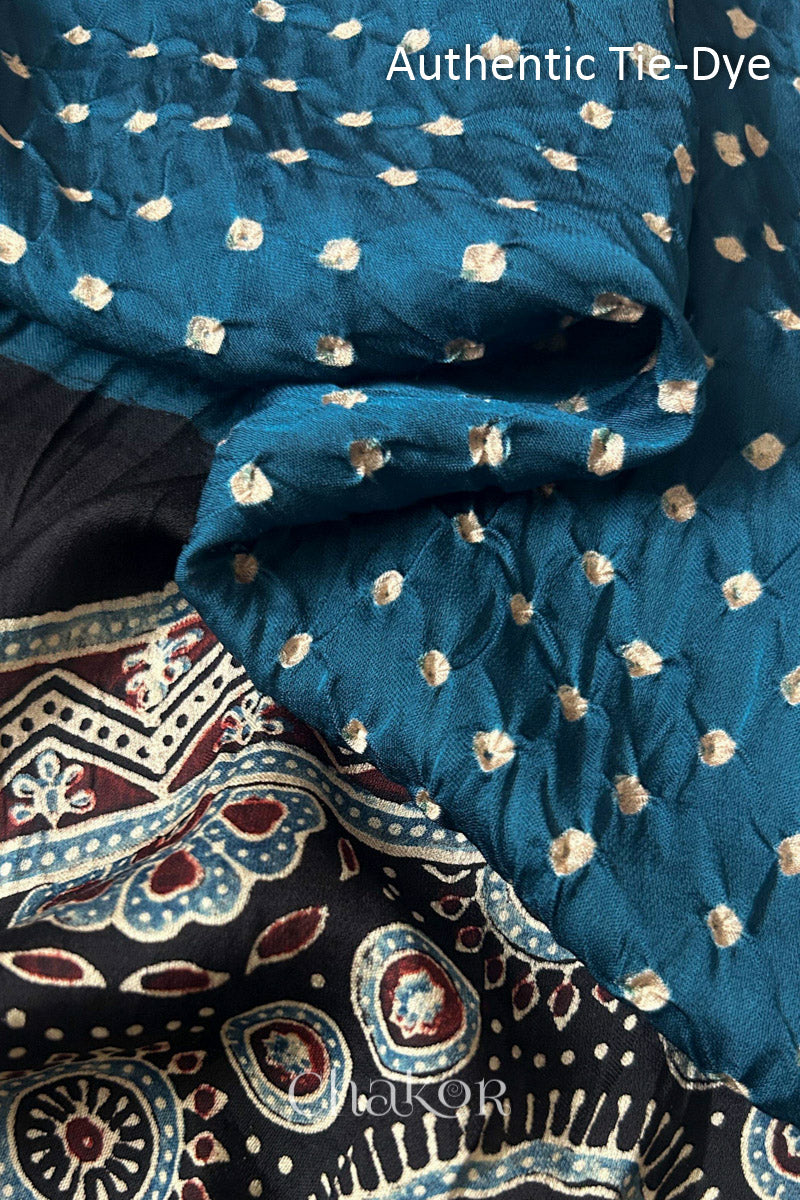 indigo blue Hand tied Bandhani dots on modal stole with contrast ajrakh pallu detail.
