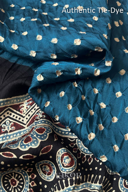indigo blue Hand tied Bandhani dots on modal stole with contrast ajrakh pallu detail.
