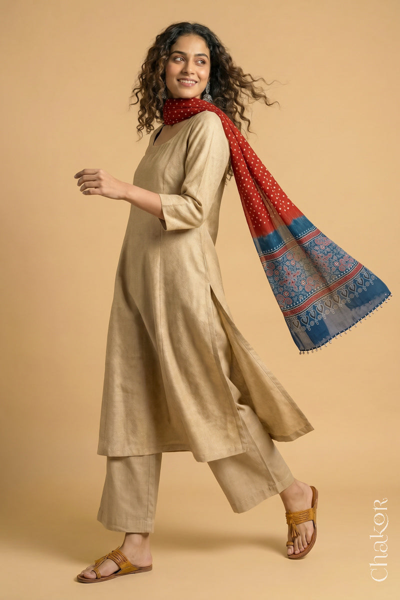 Flowing Red modal Bandhani stole with Indigo  Ajrakh pallu showing movement and lightweight drape.
