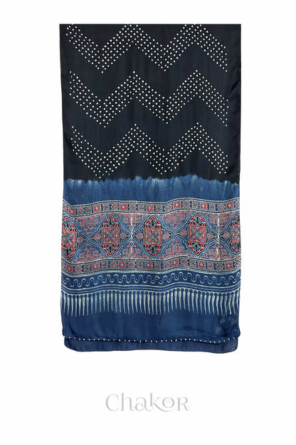 Black Bandhani modal stole with  Indigo Ajrakh pallu and traditional block print layout and glass bead edging.
