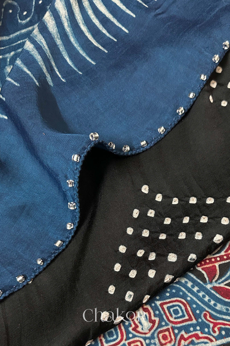 Black Bandhani and Indigo Ajrakh combination modal stole with glass bead edging detail on pallu end.
