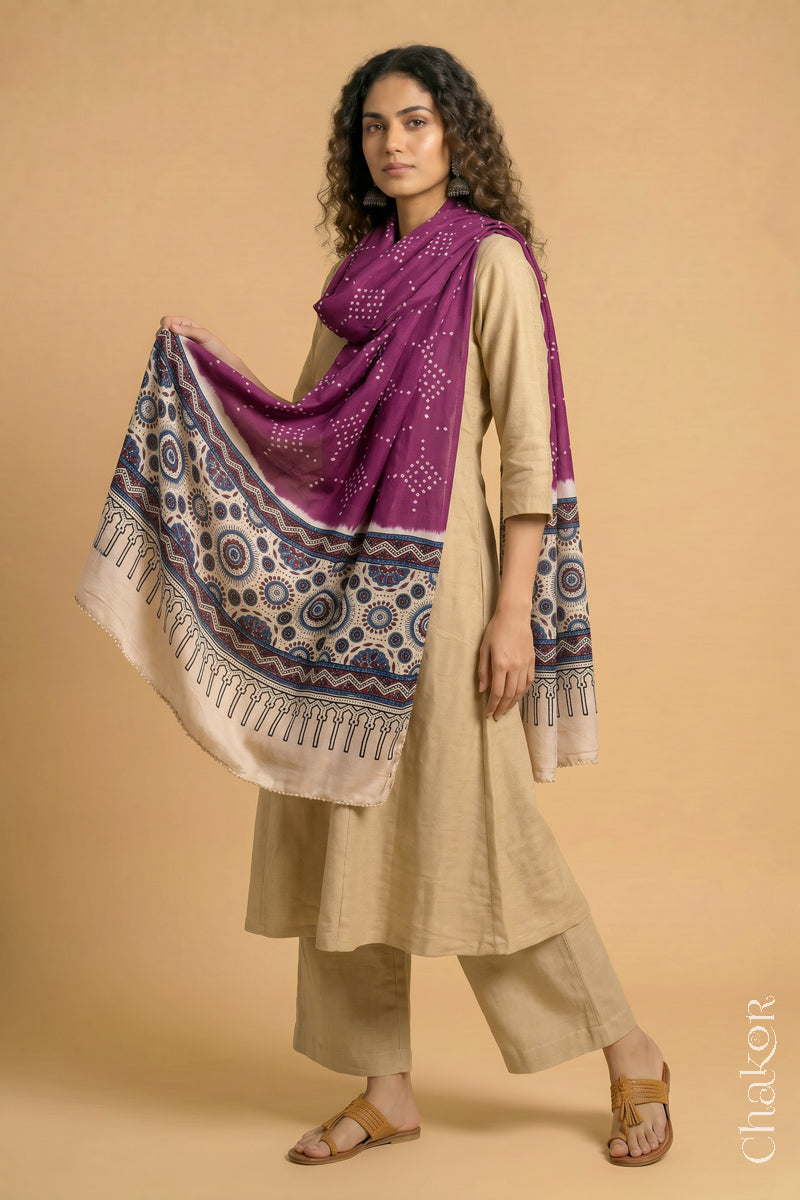 Flowing Magenta modal Bandhani stole with Off-white Ajrakh pallu showing movement and lightweight drape.
